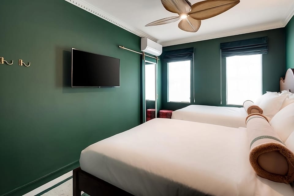 Drift off comfortably with bedside lighting and thoughtful touches.