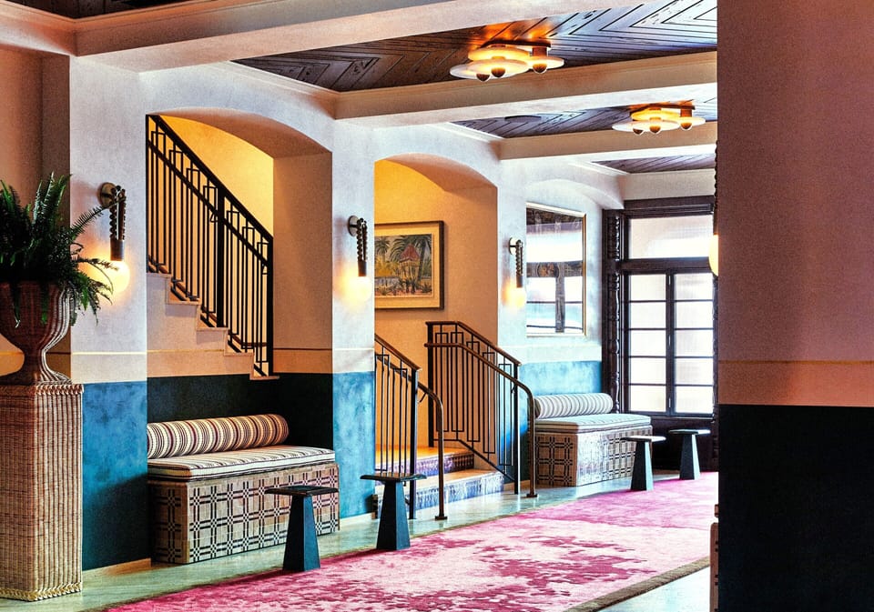 Stroll through soaring arches and settle into cozy alcove seating.