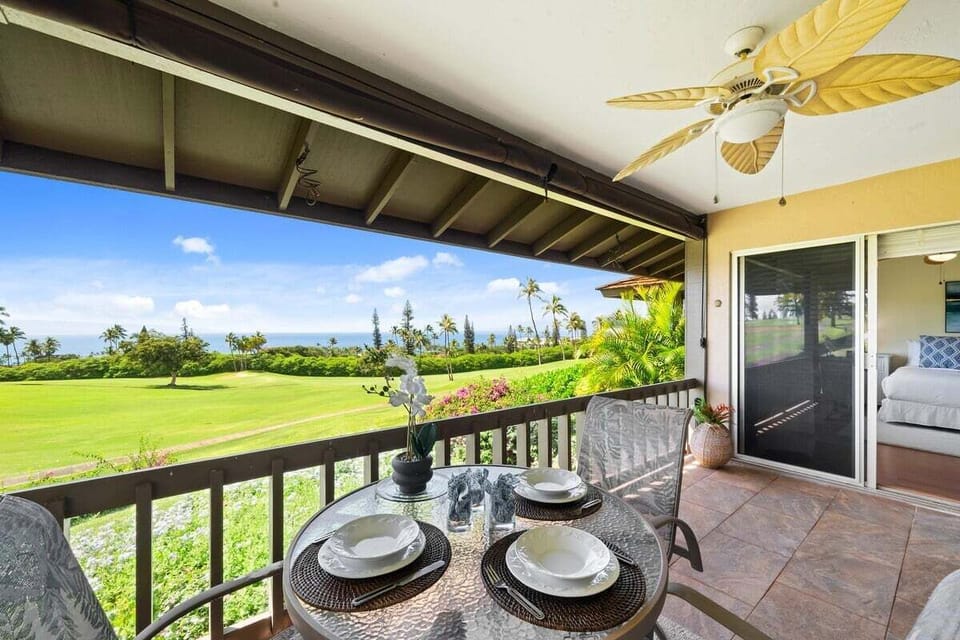 Enjoy outdoor dining on your private lanai overlooking the golf course and a peak of the ocean