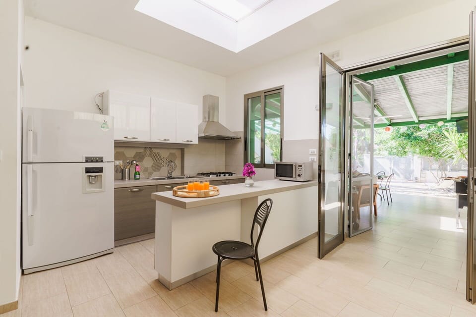 Interior Design, Flooring, Furniture, Kitchen, Floor, Ceiling, Countertop, Home, Chair, Lighting