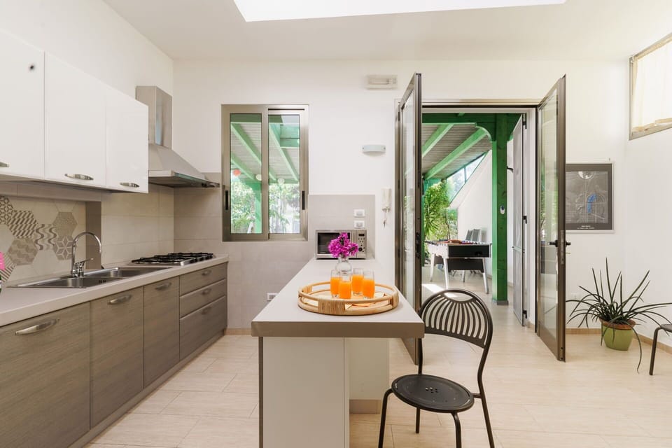 Furniture, Kitchen, Interior Design, Countertop, Kitchen Appliance, Flooring, Major Appliance, Wood, Home, Floor