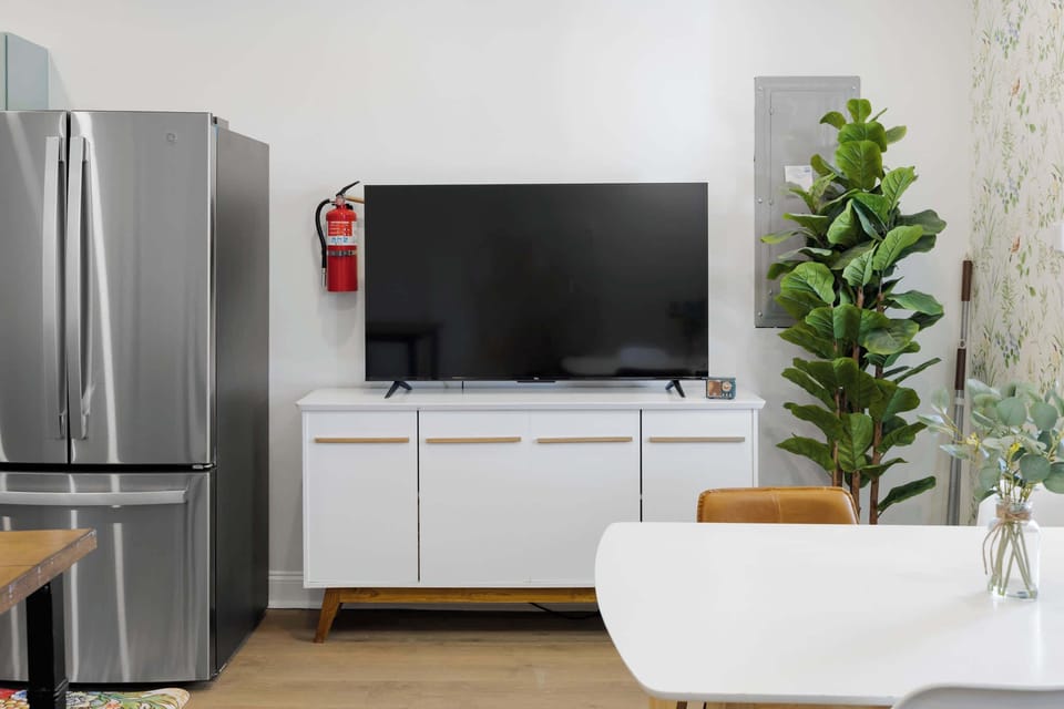 Enjoy a seamless flow from the kitchen to the living area, perfect for entertaining or cozy nights in.
