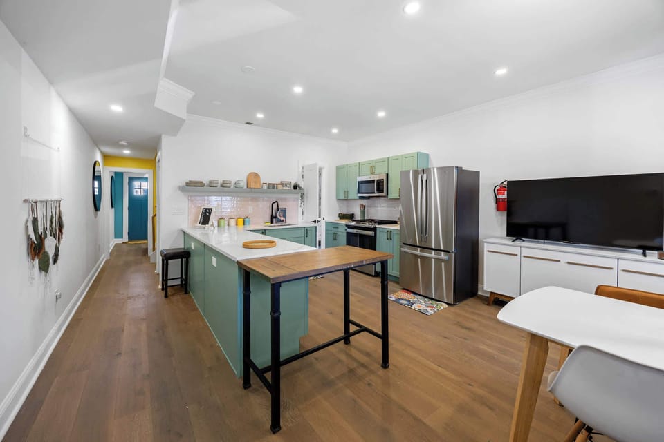 A fully equipped kitchen with beautiful finishes invites you to create memorable meals with loved ones.