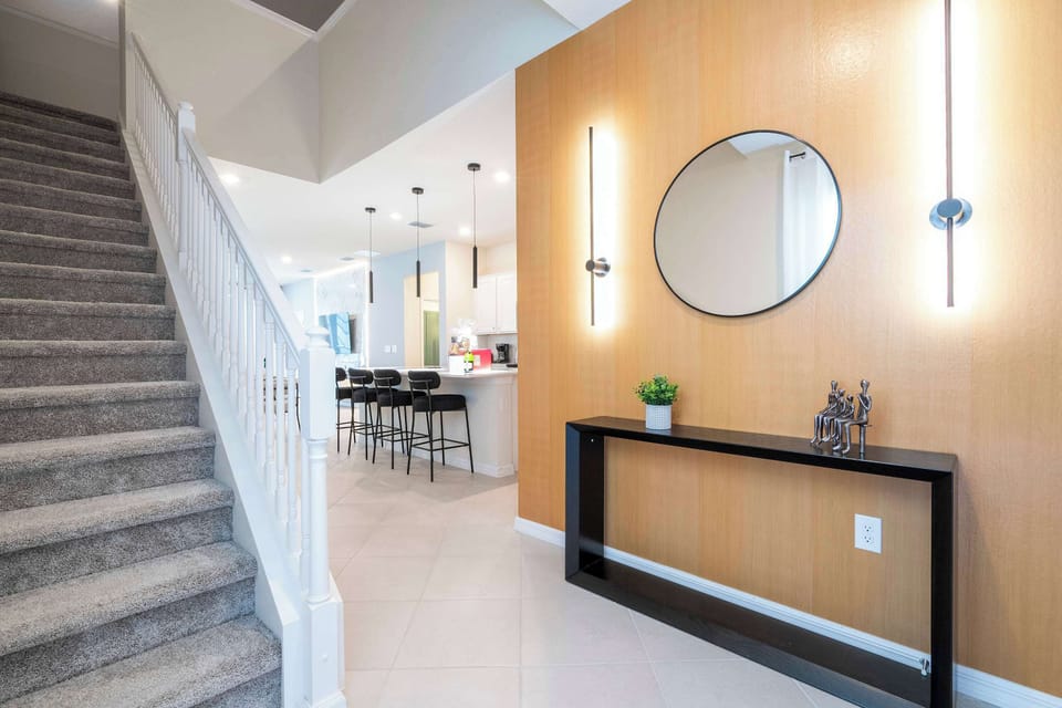 Step into a bright, spacious foyer that sets the stage for luxury and comfort throughout your stay.