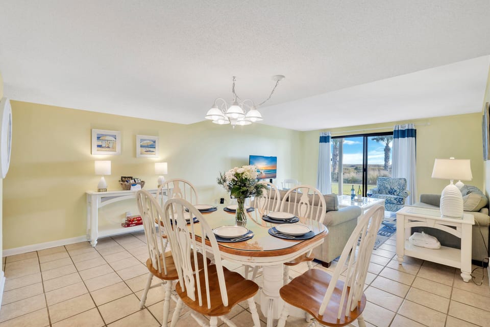 Dining table with seating for 6 for casual meals or family dinners.