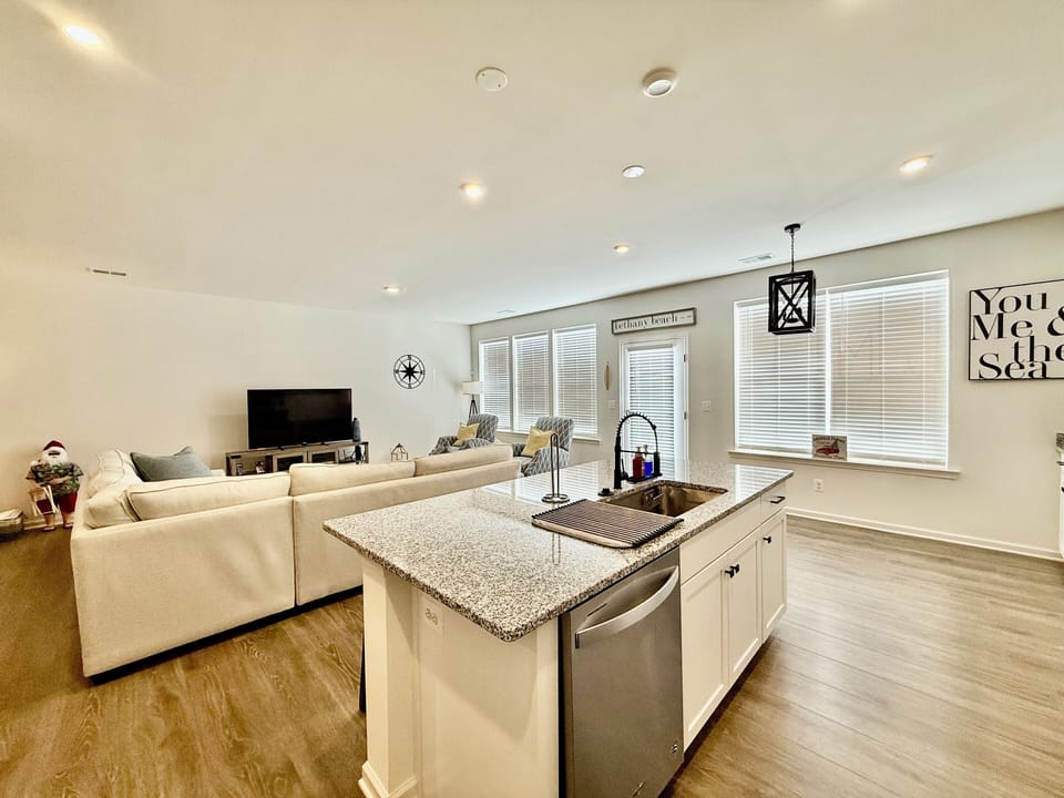 OPEN CONCEPT LIVING & KITCHEN AREA