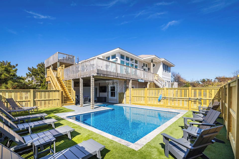 Private Pool with Outdoor Seating Perfect for Relaxing and Gathering