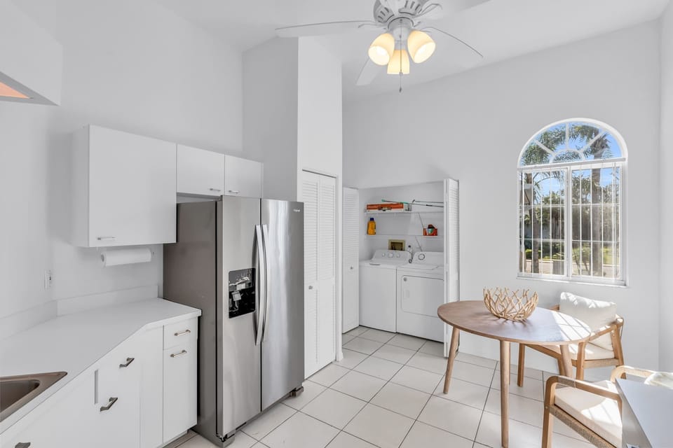 The doors are open in this photo showing where the laundry is located 