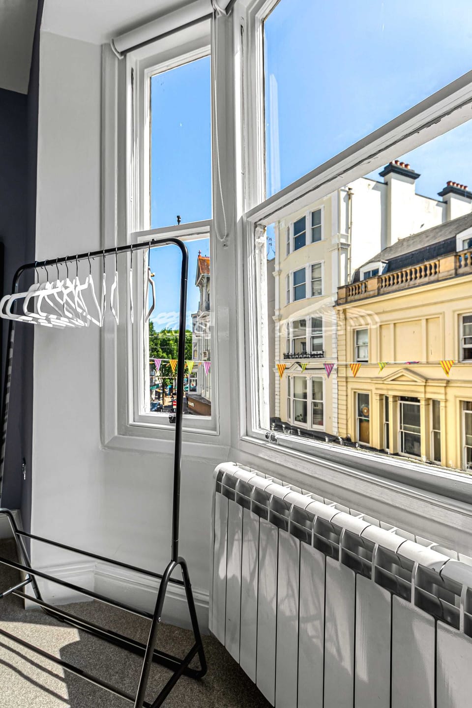 Bright window view with hanging space and sunlight