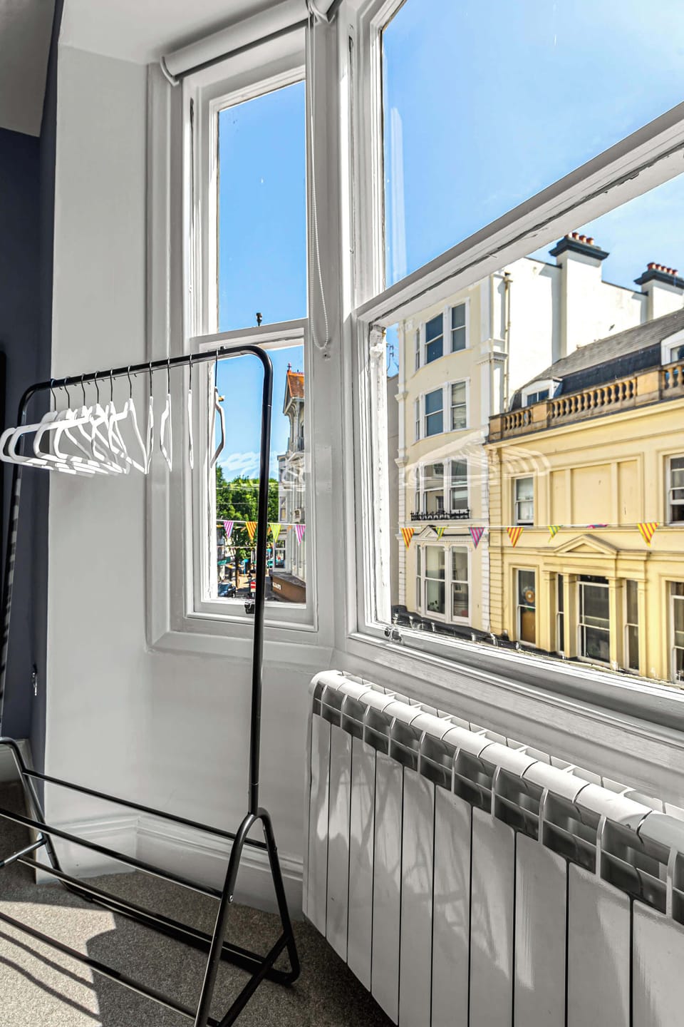 Bright window view with hanging space and sunlight