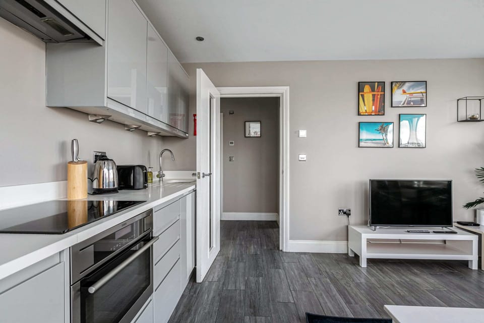 Bright, open kitchen and living area—perfect for cooking, relaxing, and spending time together.