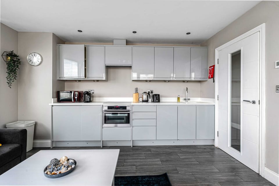 Cook up a storm in this sleek, fully equipped kitchen.