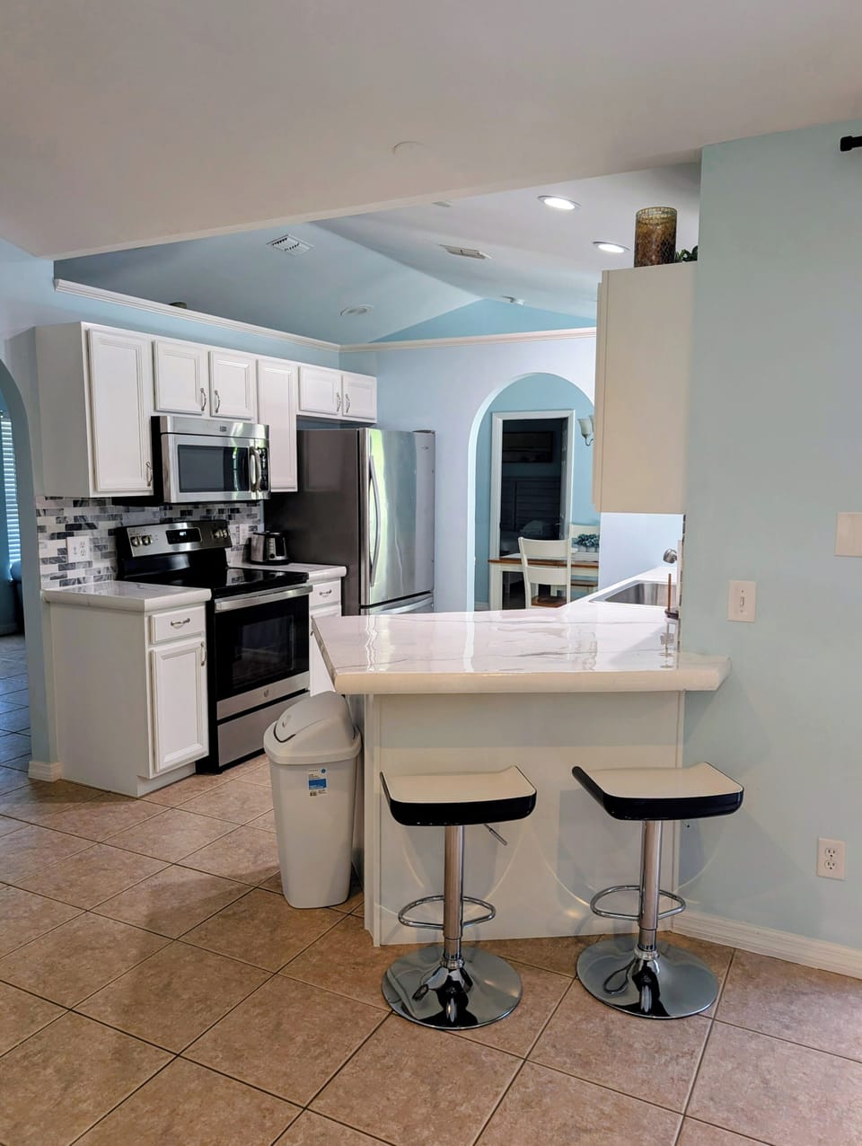 breakfast bar, fully equipped cookware, dishes, wine glasses, BBQ tools, coffee