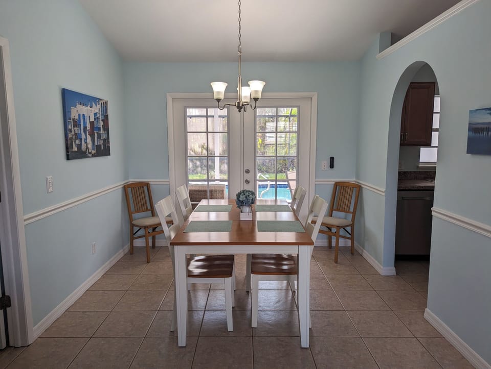 inside dining, seats 6, french doors leading to pool