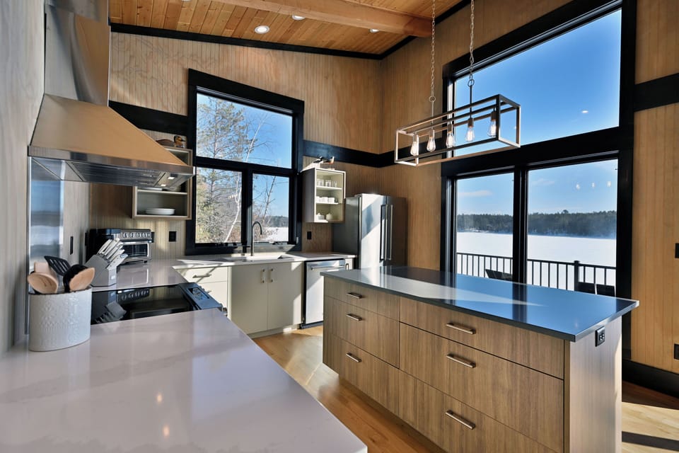 Eat-in kitchen with island and stools