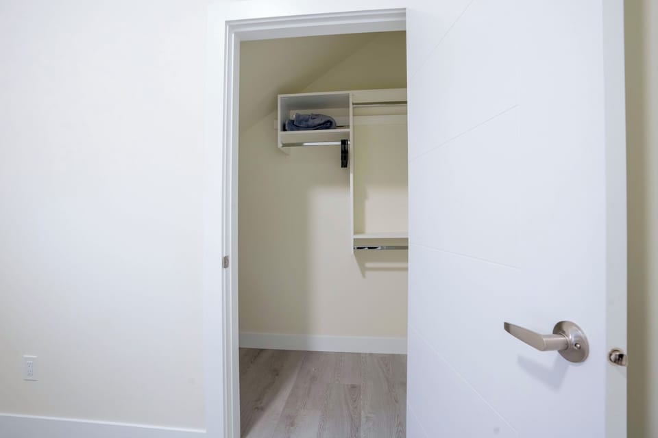 Master closet for first bedroom. 