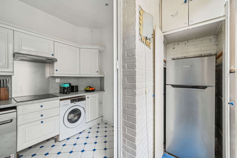 The kitchen is fully equipped to prepare a simple meal 