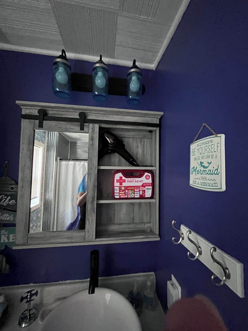Hairdryer and first aid kit