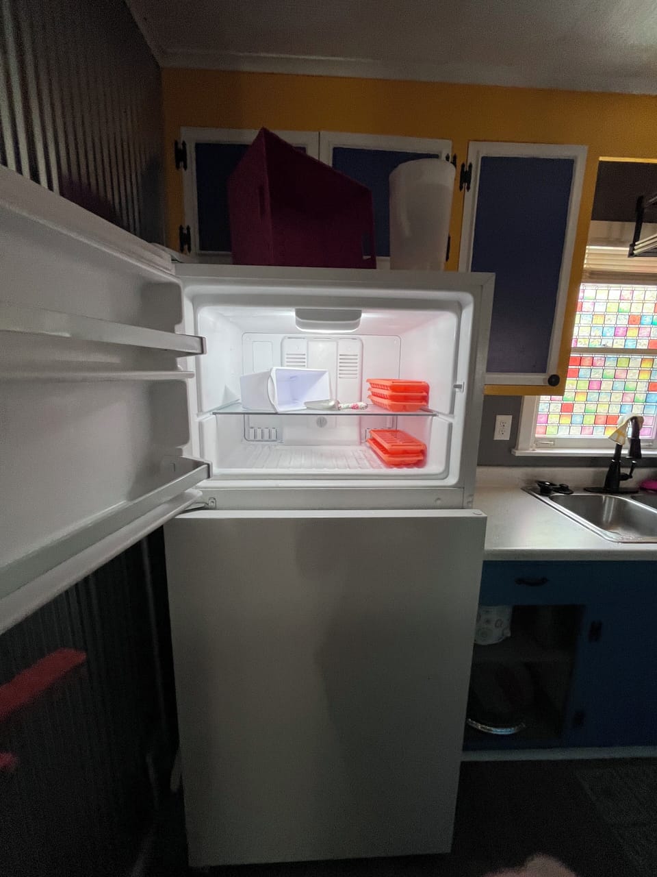 Freezer with ice trays , bin and scoop