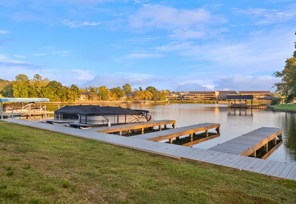 A scenic spot by the lake, complete with a dock, offers endless opportunities for fishing, relaxing, or simply soaking up the peaceful atmosphere.