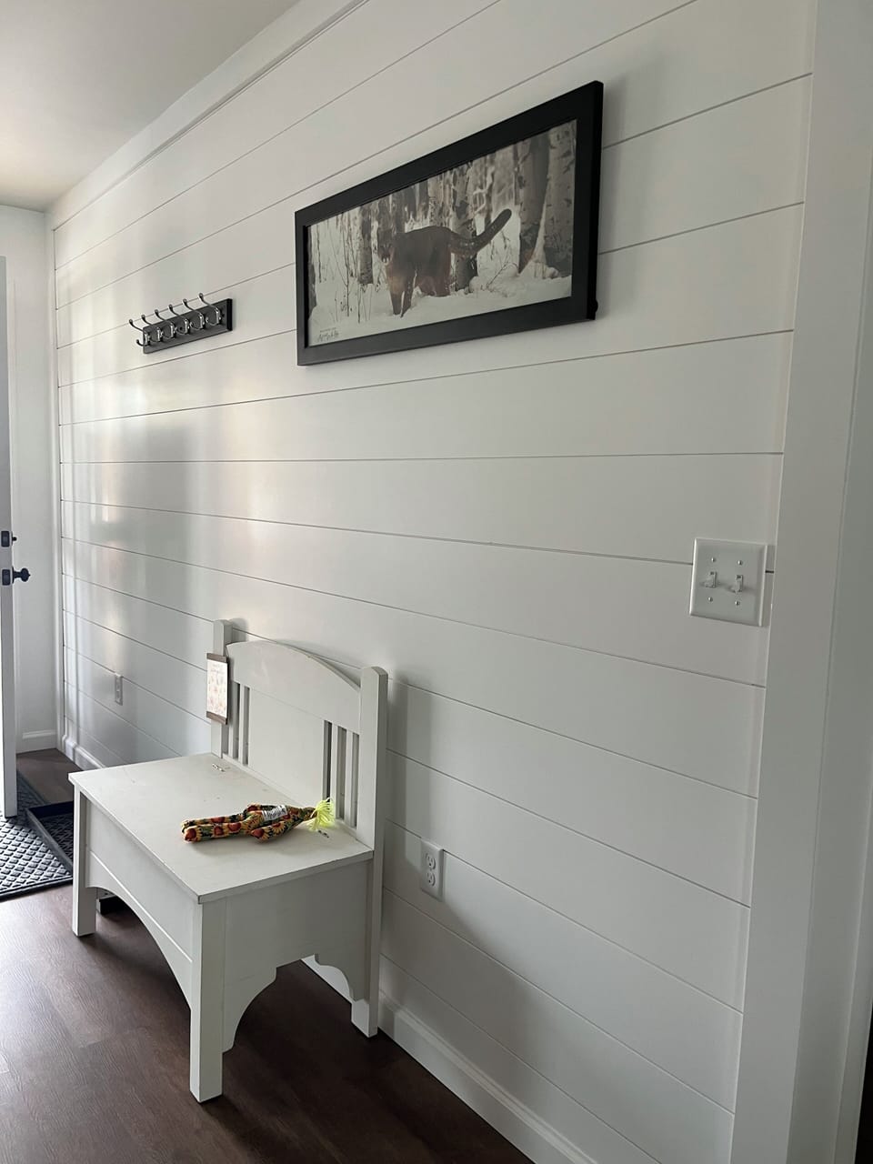 Coat hanger and bench at the front entrance for your convenience.