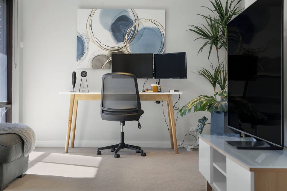 Dedicated workspace with desk and monitor for remote work