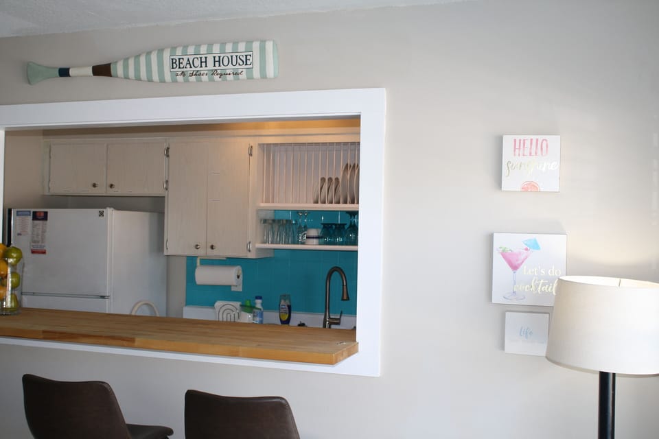 Kitchen passthrough from front door.