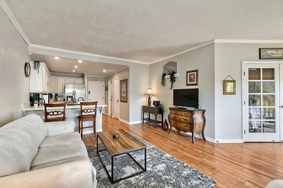 Living room is connected to kitchen area