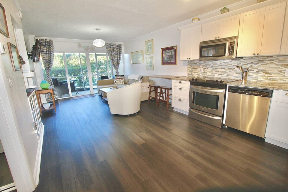 The spacious open floor-plan is well appointed and bright!