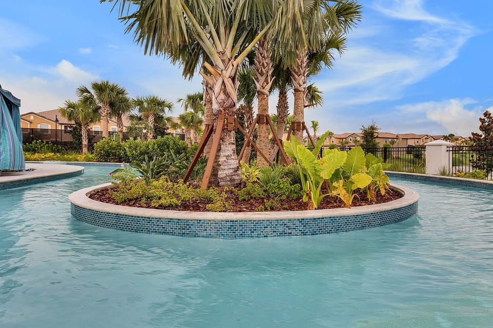 Take a refreshing dip in the resort-style lazy river, surrounded by lush greenery and swaying palms. Perfect for a day of relaxation and family fun