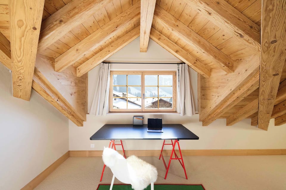 the office table with views of the snow covered town 