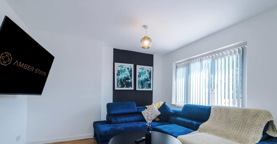 A bright and welcoming living room with comfortable seating, soft lighting, and thoughtful décor. The open layout creates a perfect space for relaxing, entertaining, or enjoying quiet moments