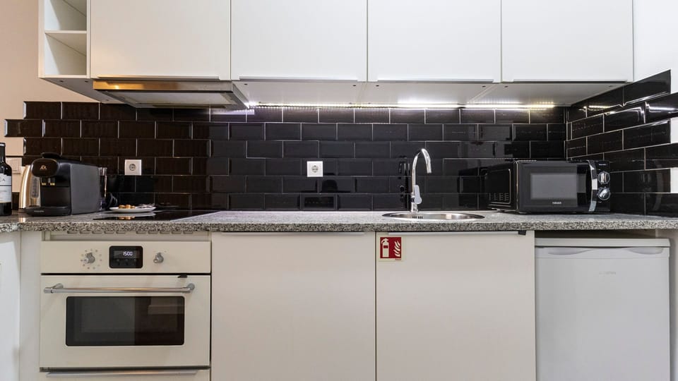 Our kitchenette is fully equipped with high-end appliances #modern #home