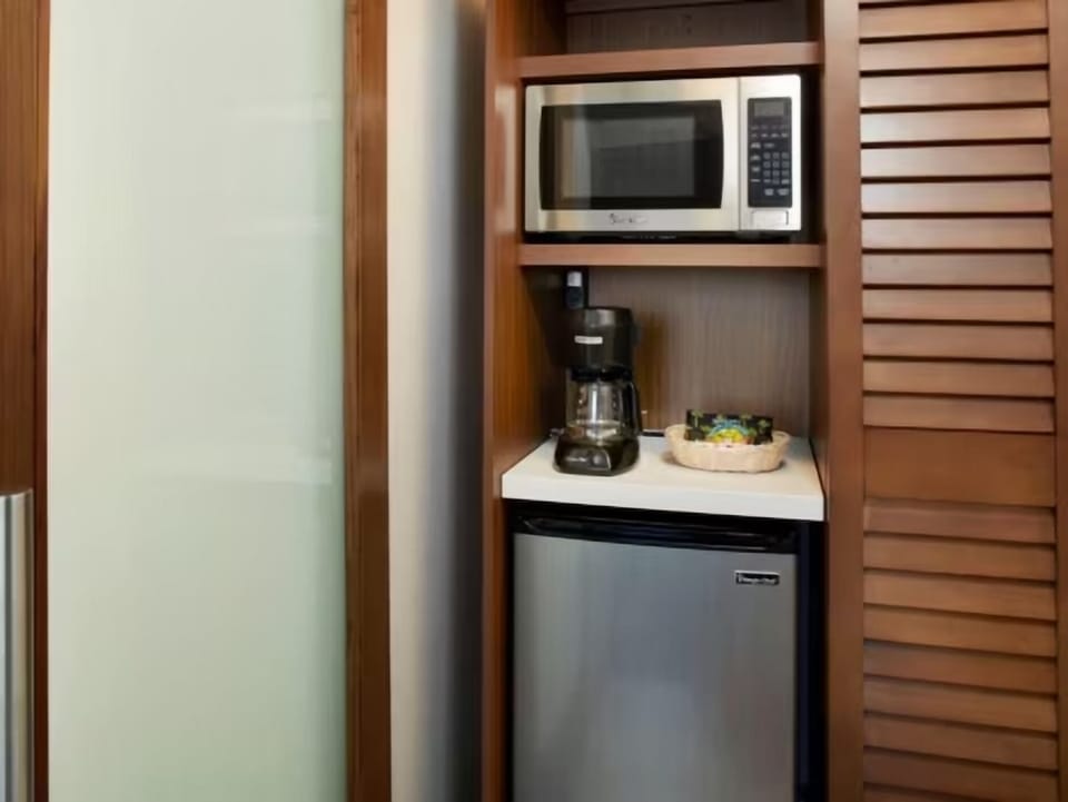 Fuel your day with easy snacks from the in-room kitchenette.