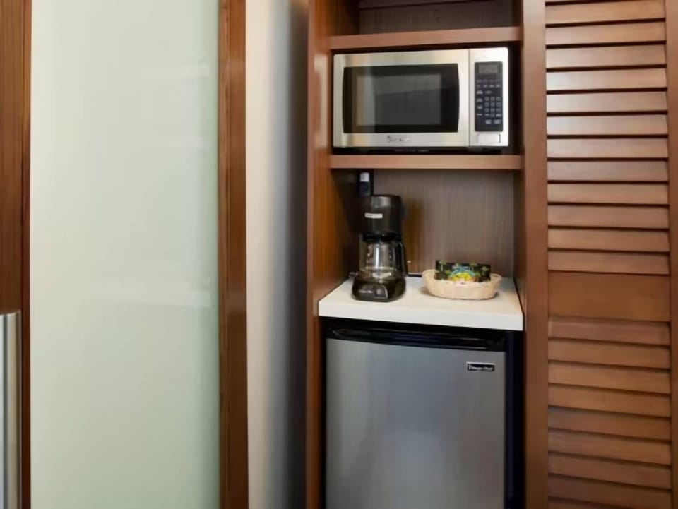 Fuel your day with easy snacks from the in-room kitchenette.