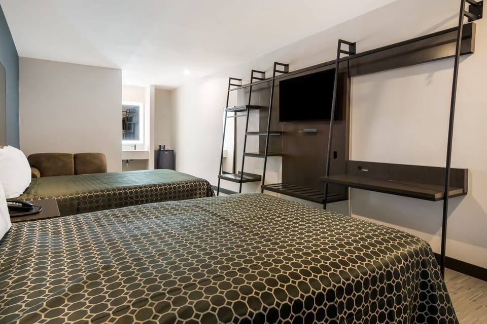 Relax after exploring with two beds and an easy workspace.