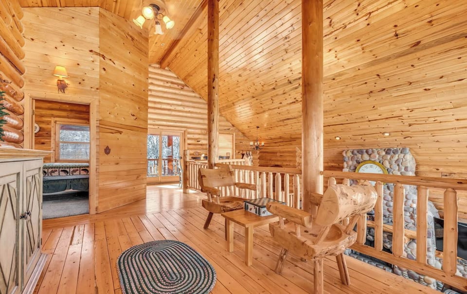 Upstairs game area, overlooking main floor living room.