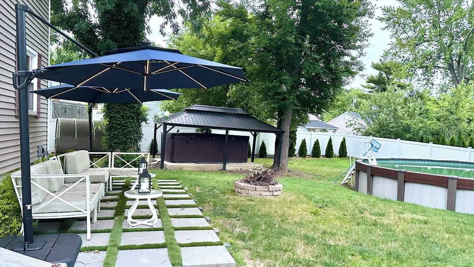 Backyard with seating area and Grill