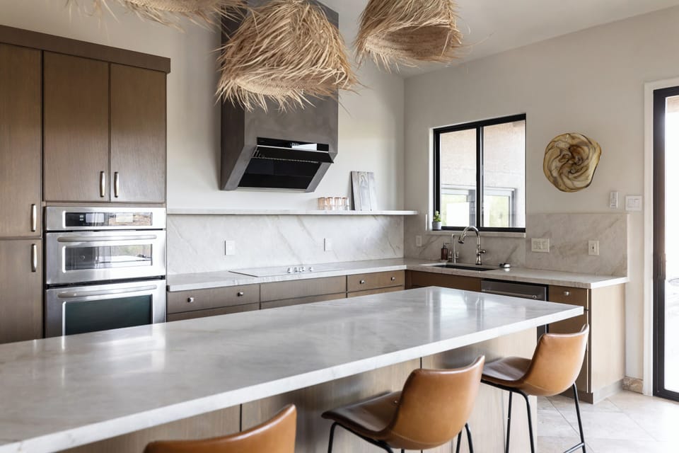 Kitchen | Quartzite Countertops | Stainless Steel Appliances
