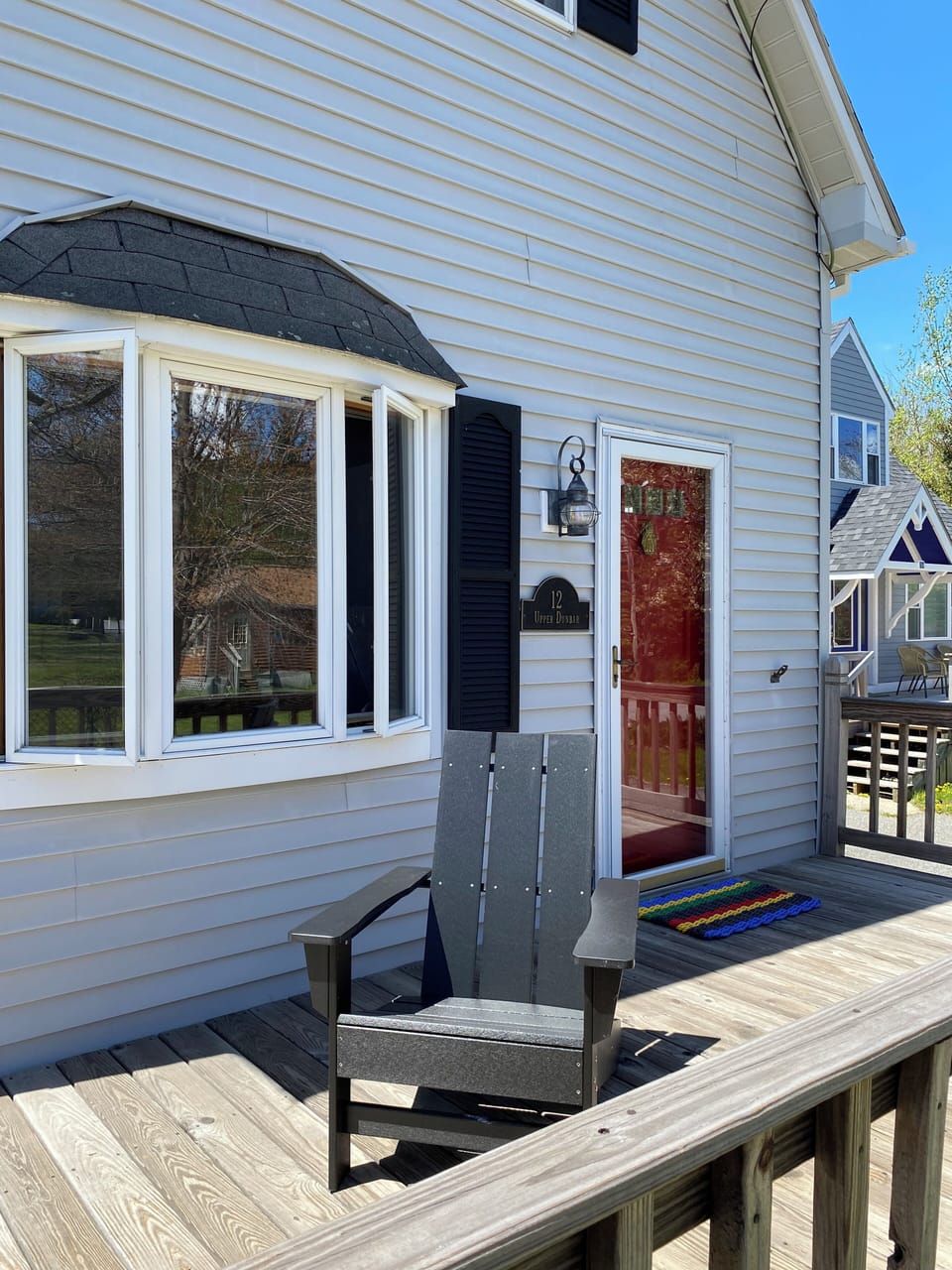 Front Door with wrap around deck and view of Day Mountain