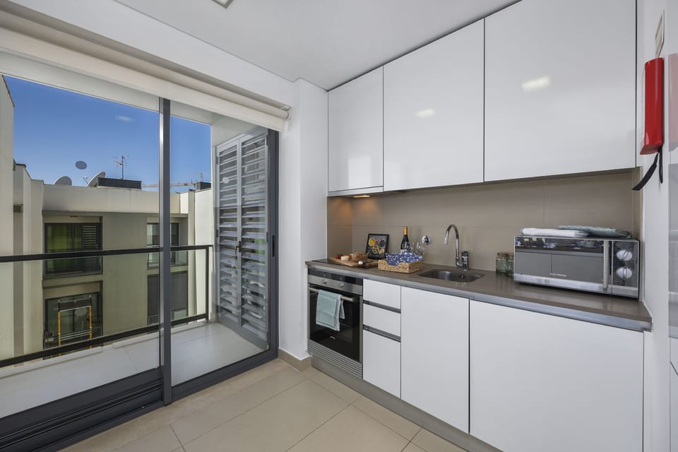 Kitchen with small balcony