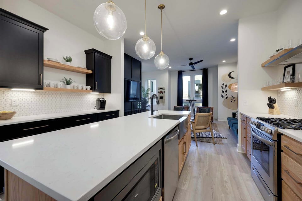 Our kitchen features a fridge, oven/stove, a dishwasher, and a GE Appliances microwave for quick reheats. Plus, enjoy breakfast with our 4-slot toaster, Oster blender, and Cuisinart electric handheld whisk—all designed to make your stay convenient