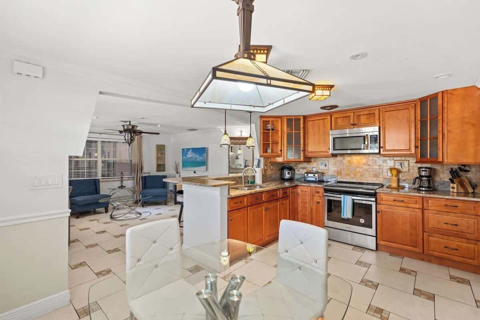 Enjoy the spacious open layout, perfect for family gatherings and easy flow between living, dining, and kitchen areas #NaplesVacation