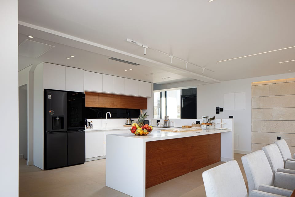 The fully equipped kitchen, complete with modern appliances, ensures effortless self-catering