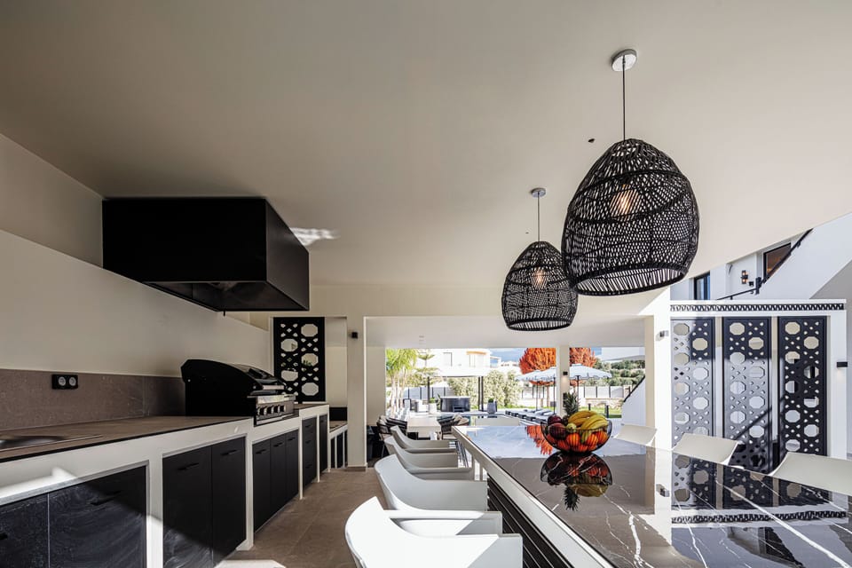 Savor al fresco dining with a fully equipped BBQ and shaded seating.