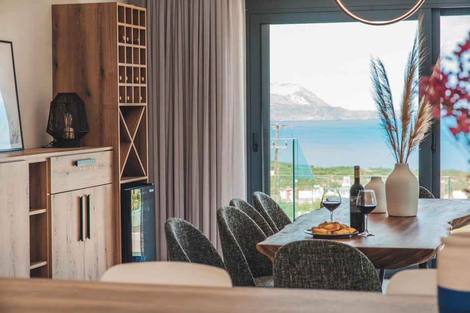 A large dining table, comfortably seating up to eight guests