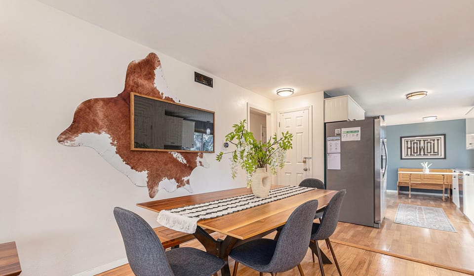 Gather around our dining table, perfect for memorable family meals.