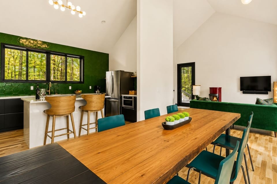 Step into a space designed for both functionality and style, where culinary creativity meets elegant dining. The open-concept kitchen is a chef’s dream, featuring sleek countertops, state-of-the-art appliances, and ample cabinetry for all your kitche