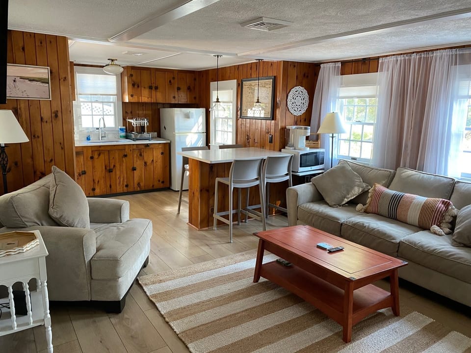 Cape Cod Knotty Pine LR and Kitchen View