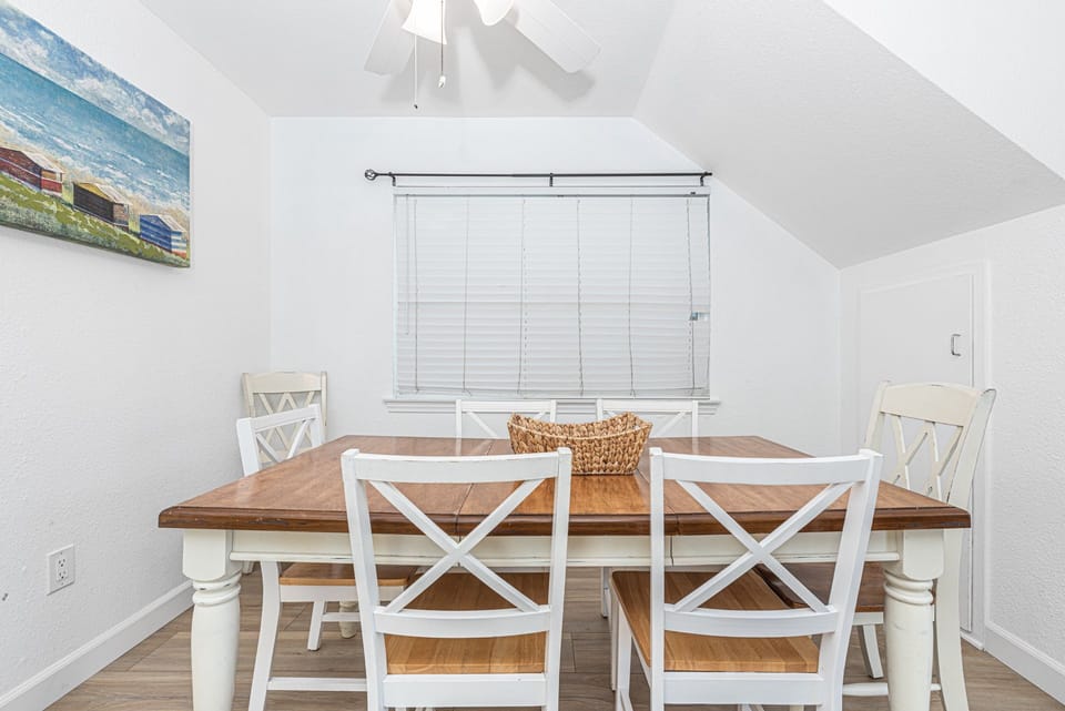Dining table with seating for six perfect for casual coastal meals
                